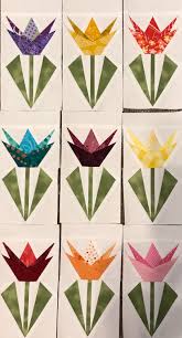 This quilt is as easy as it gets. Pin By Jackie Mcintire On Quilt Patterns Flower Quilts Paper Peicing Patterns Floral Quilt