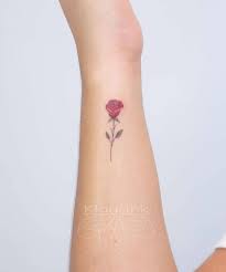 In fact, the rose tattoo is equally as popular in western cultures as the lotus is in eastern cultures, both flowers representing similar symbols of beauty and femininity. Red Rose Tattoo On The Wrist
