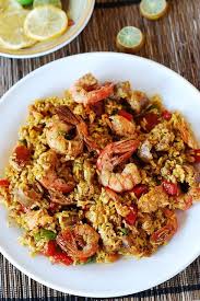 Paella With Chicken Shrimp And Sausage Easy Paella Food Seafood Paella
