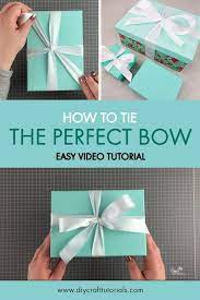 How To Tie A Perfect Bow Every Time Gift Wrap Like A Pro With This Easy Tiffany Bow Tutorial Video Diy Gift Box Gift Wrapping Inspiration Diy Gifts