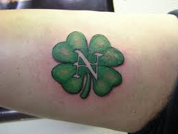 Shamrock four leaf with skull tattoo on side leg. Celtic 4 Leaf Clover Tattoos Four Leaf Clover Tattoos Designs Ideas And Meaning Four Leaf Clover Tattoo Shamrock Tattoos Clover Tattoos