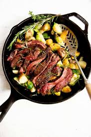 Once the oil is very hot, add steaks to the skillet. One Skillet Coffee Rubbed Steak And Potatoes Dinner Wholefully