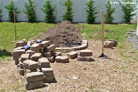Digging the trench is a very important step in building a raised garden. How To Build A Raised Garden Bed For Vegetables Garden Sanity By Pet Scribbles