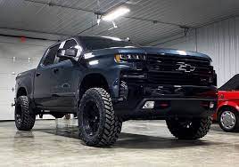 2019 Chevrolet Silverado Trail Boss Equipped With A Fabtech 1 5 Lift Kit Lifted Chevy Trucks Chevy Trucks Silverado Chevrolet Silverado