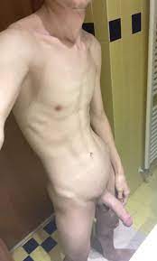 Slim nude guy with erection - Penis Pictures