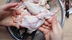 Set the flat side of the wing down on a cutting board, then cut along the bone horizontally. Deboning Chicken Wings W Kitchen Shears For Stuffed Chicken Wings Youtube