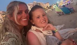 Erin McClean looks forward to husband James' return from Oz as she jets off 