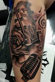 From musical notes to instruments like the guitar and keyboard, discover the best music tattoos for men. Custom Music And Rose Piece I Did Artist Phoenixblaze Phoenixblaze Tattoo Blackandgrey Musictat Guitar Tattoo Guitar Tattoo Design Music Tattoo Sleeves