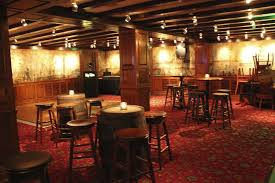 Wine Barrels And Dark Setting For Lemon Limes Speakeasy Theme Party Lemon Lime Event Design Speakeasy Prohibition Party Wine Barrel Table