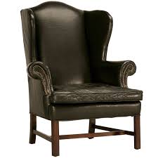 Wingback Chairs In Anton Marant S Study Classic Vintage Chippendale Style Black Leather Wingback Chair Leather Wingback Chair Wingback Chair Leather Wingback