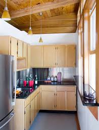 Designer sarah richardson gives this small, open, white kitchen a cheery feeling with pops of sunny yellow while the gray stone floors ground the space. 27 Space Saving Design Ideas For Small Kitchens