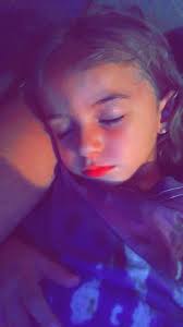 Mia brushing her teeth before bed.