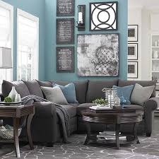 The Shade Scheme In This Living Room Includes Tones Of Blue Green Jade Eco Friendly And Yellow Green Fo Living Room Grey Living Room Color Grey Sectional Sofa