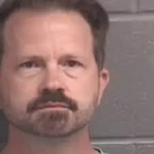 Georgia couple accused of trying to starve 10-year-old son to death remains  behind bars