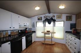 When this couple purchased their basic double wide 25 years ago, it looked nothing like it does today. Modular Kitchen Small House Modern Kitchen Design Novocom Top