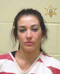 HAUGHTON WOMEN ARRESTED FOR ATTEMPTING TO KILL HUSBAND Bossier Sheriff's  Office detectives arrested a Haughton woman Wednesday morning after she  turned herself in for trying to kill her husband. Adrianne D. Warren,