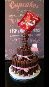 Two Tier Gravity Maltesers Cake M M S Kit Kats And Mini Eggs Anti Gravity Cake Gravity Cake Cake