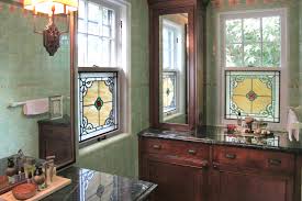 A stained glass window treatment is a great way of adding colour. Bathroom Stained Glass Window With Bevels And Jewelss