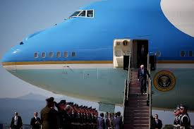 Trump, 79, Grips Railing for Dear Life While Descending Air Force One Steps