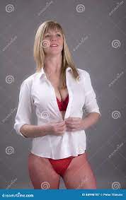 Aged Middle Undressing Woman Stock Photos - Free & Royalty-Free Stock  Photos from Dreamstime