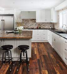 Love how this kitchen renovation creates an open feel for our clients to their dining room and office and a better transition to back yard! Hottest Trending Kitchen Floor For 2020 Wood Floors Take Over Kitchens Everywhere