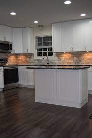 Hi guys, i just got back a couple of days ago from toronto, watching some of the panam games. White Shaker Kitchen With New Dark Grey Laminate Flooring Klassisch Modern Kuche Washington D C Von Nova Design And Build