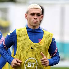 Boy looks 'more like phillip schofield than phil foden' after botched haircut. Man City S Phil Foden Backed For England Start Over Man United Target Jadon Sancho Manchester Evening News
