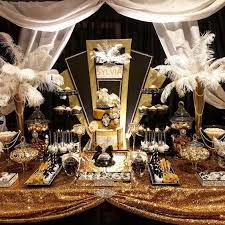 Take a cue from jay gatsby himself and invite your guests to dress to the nines as you wine and dine the night away. Pin By House Of Tonini Cookbook S A On Gatsby Birthday Party Gatsby Birthday Party Gatsby Party Decorations Great Gatsby Party Decorations