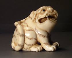 Netsuke originated in 17th century japan as a means for men who wore robes known as kimono, which lacked pockets, to hold their belongings. Netsuke Chinese And Japanese Ivory Carving