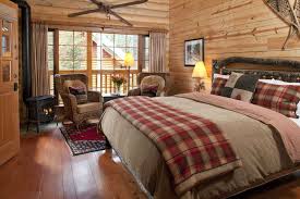 The log cabin home decor photos featured here showcase the bedrooms, bathrooms, kitchen and dining room of a monumental mountain retreat. Luxury Log Cabins In Canadian Rockies Cathedral Mountain Lodge Cabin Bedroom Decor Lakehouse Bedroom Rustic Master Bedroom