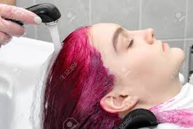 To cover gray or white hair, to change to a color regarded as more fashionable or desirable. Girl In A Beauty Salon Process Of Washing Your Hair In A Hairdresser After Dyeing Stock Photo Picture And Royalty Free Image Image 132227525
