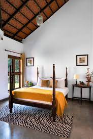 The wooden wall and light shade make this design elegant. Interior Designing In Kerala Bedroom Ideas And Photos Houzz