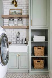 Check spelling or type a new query. 11 Best Green Paint Colors For Cabinetry According To Experts Sage Green Kitchen Green Kitchen Cabinets Laundry Room Renovation