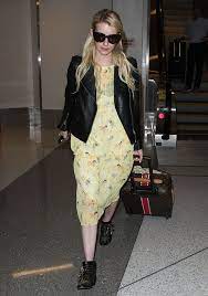 Emma Roberts Makes Summery Dress Edgy With Leather Jacket And Studded Boots Emma Roberts Leather Jacket Dress Studded Boots