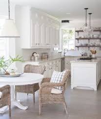 While the crisp white on the banquette remains the same, the change in direction adds texture to the space. 7 White Kitchen Tables Ideas Home Kitchens Home Decor Home