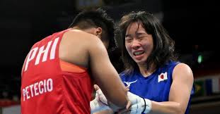 Nesthy petecio reacts after winning her women's featherweight quarterfinal bout which assured her of a podium finish in tokyo. Uemp9xjxihvu0m