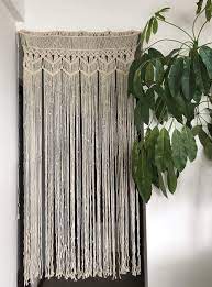 It's probably not what you're thinking though, no fancy expensive gadget! Amazon Com Macrame Curtain For Doorway Room Divider Door Curtains Woven Wall Hanging Tapestry Bedroom Door Window Decoration Wedding Photo Backdrop 37 5 W X 79 L Kitchen Dining