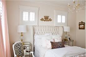 Here, graphic pink and white prints adorn the wall above the bed. Chic And Glam With Pink White And Gold Bedroom Ideas Tips