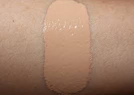 Here is a comparison swatch next to but swatches aside, what is it about this luxurious cle de peau foundation that has me hesitating to tell you to empty your wallet and run out and buy it. Cle De Peau Radiant Fluid Foundation Natural Review