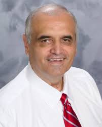 Robert Burnside, a beloved high school principal in the Cincinnati suburbs,  has resigned. Some of his former students are outraged.
