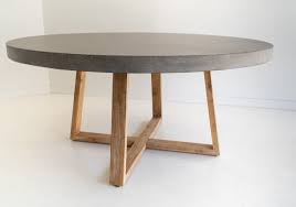 My dad had built a round kitchen table for the house, but it was a bit too massive for my liking, and didn't leave much room for the knees. 1 6m Alta Elkstone Round Dining Table Speckled Grey With Light Honey Legs Abide Interiors
