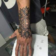 As a result, the design uses circular patterns or shapes radiating out from a central point. 101 Cool Tattoos For Men Best Tattoo Ideas Designs For Guys 2021 Mandala Wrist Tattoo Mandala Tattoo Design Mandala Hand Tattoos