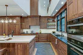 Pick something that you like and that matches and even if you have a bulthaup kitchen this is a favorite color combo walnut kitchen (minus the blue tile and whatever the realtor is trying to hide on the floor) The Beauty Of Walnut Kitchen Cabinets By The Kitchen Classics