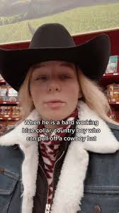 Guy in Cowboy Hat Helping with Boxes