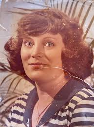 Can someone clean up old family photo?