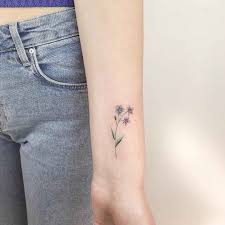 What is the symbolism of a forget me not tattoo? Flower Tattoos Best Tattoo Ideas Gallery