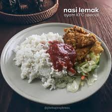 1 piece of chicken, nasi lemak, hard boiled egg, sambal anchovies, peanuts, cucumber, drink. Nasi Lemak Ayam Kfc Special