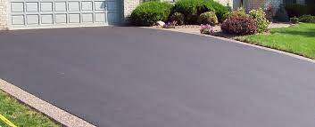 The height of the edging will need adjustment after. How To Properly Edge Your Asphalt Driveway Richfield Blacktop