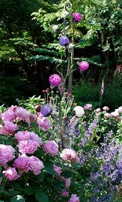 It's all handcrafted here in the south west and looks fantastic in a garden border. Glass And Metal Garden Design Sculptures