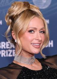 Paris Hilton, at 44, looks as if she's ageing backwards at an event in Los  Angeles, appearing younger than ever. The socialite has always claimed  she's never had Botox, injectables, or plastic